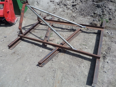 Tractor with levelling bar